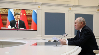 Следвайте Гласове в Китайският президент Си Дзинпин и руският президент Владимир